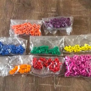 Assorted collection of hanger clip size tags